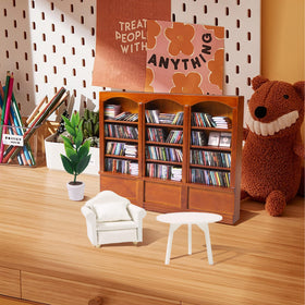 DIYDEC Mini Bookshelf dollhouse decoration enhances whimsy.