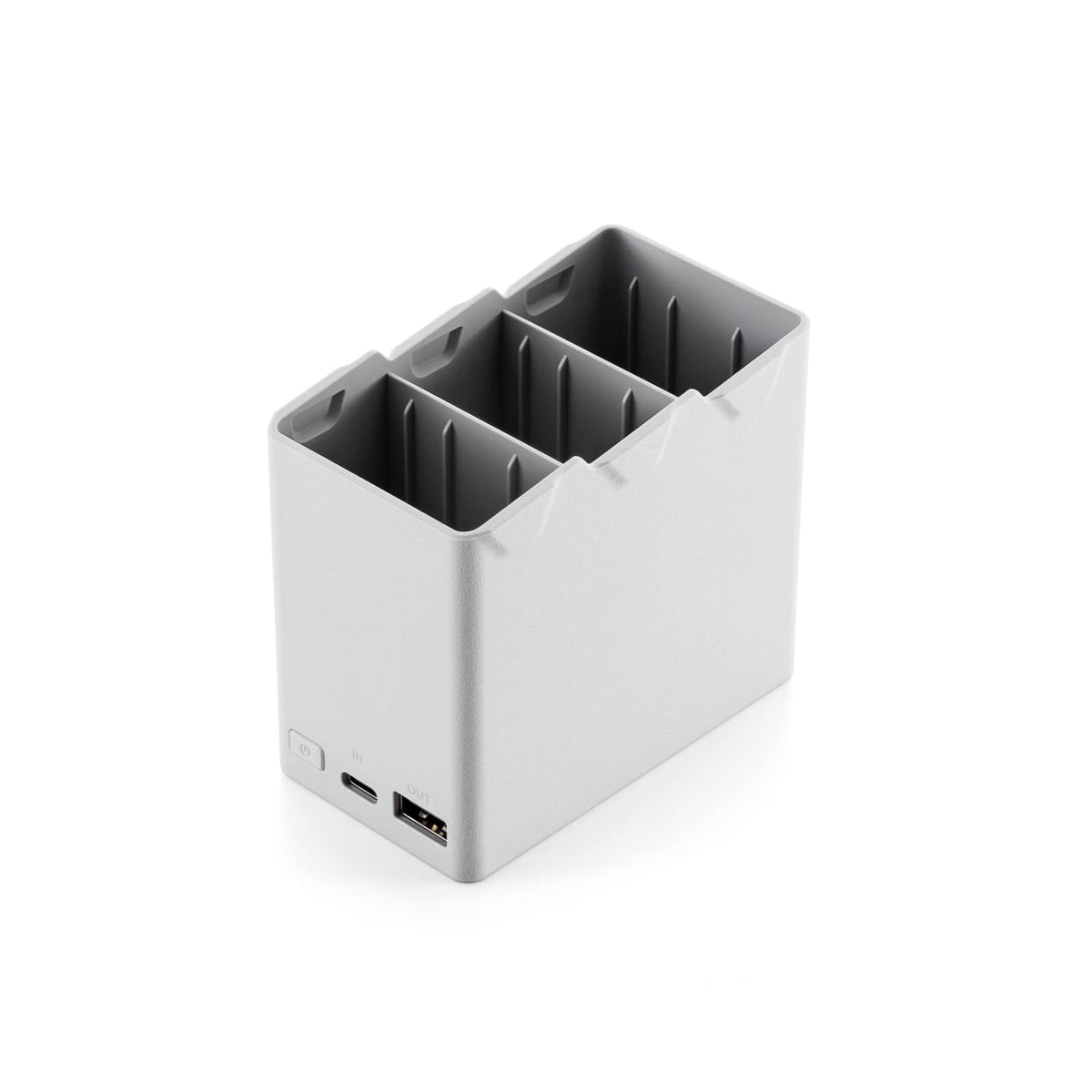 DJI 30W USB-C charger powering Mini 3 Pro batteries quickly.