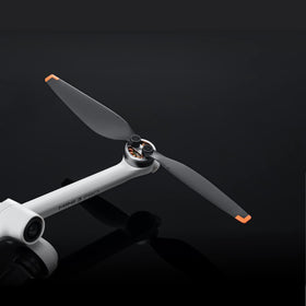 DJI propeller installation guide shows correct attachment to the arm for Mini 3 Pro and Mini 4 Pro.