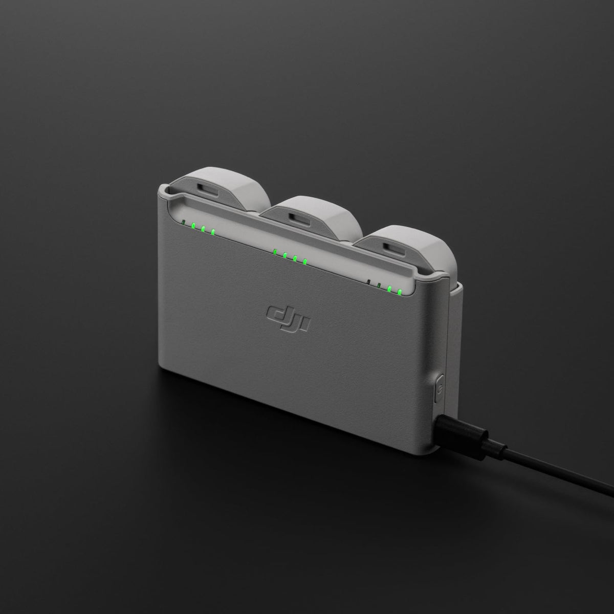 DJI Neo Two-Way Charging Hub powers a phone or goggles on the go