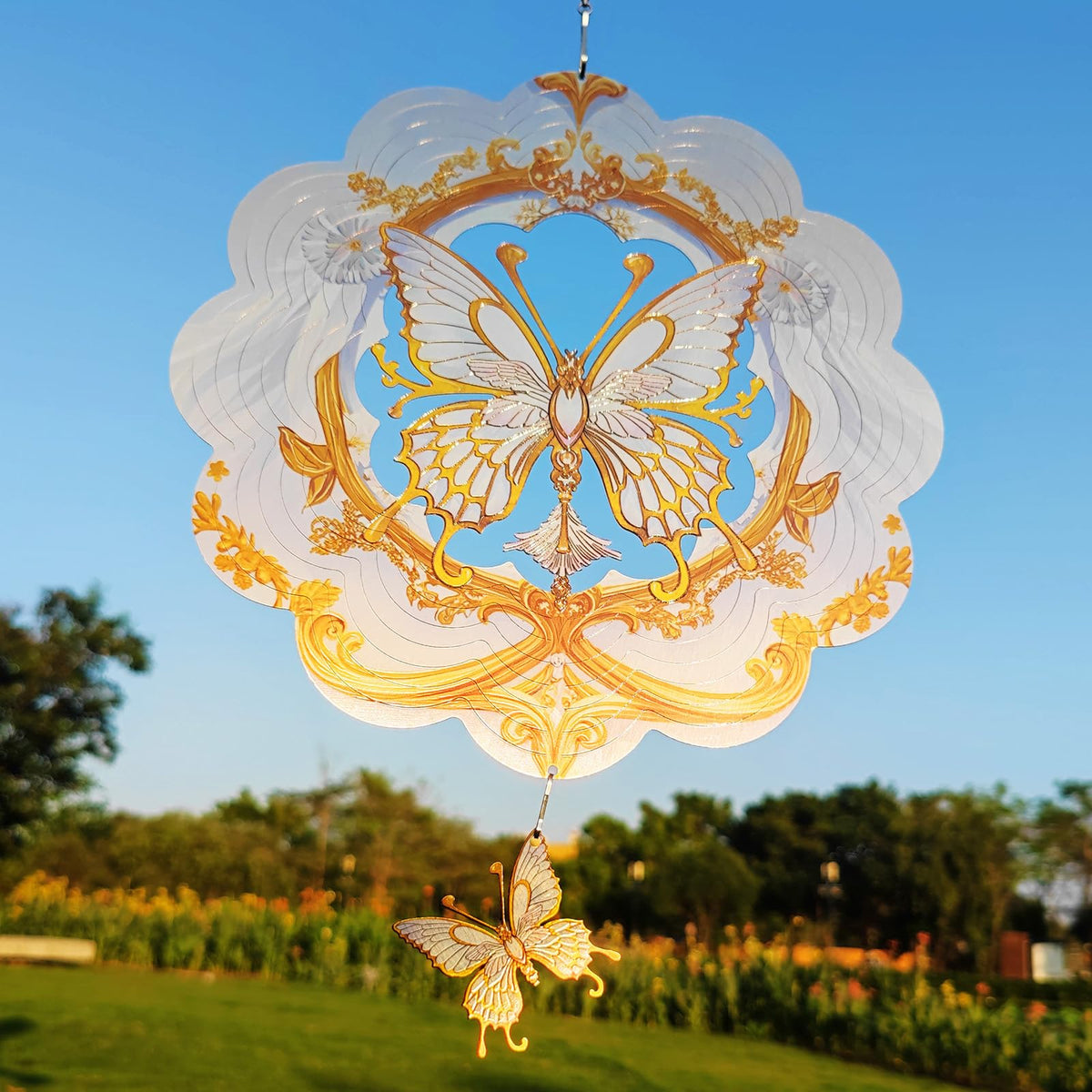 DJUAN Butterfly Wind Spinner packaging-instruction outlines flat-pack delivery and easy shaping guidance.