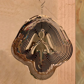 DJUAN mirror-reflection angel spinner catching sun colors