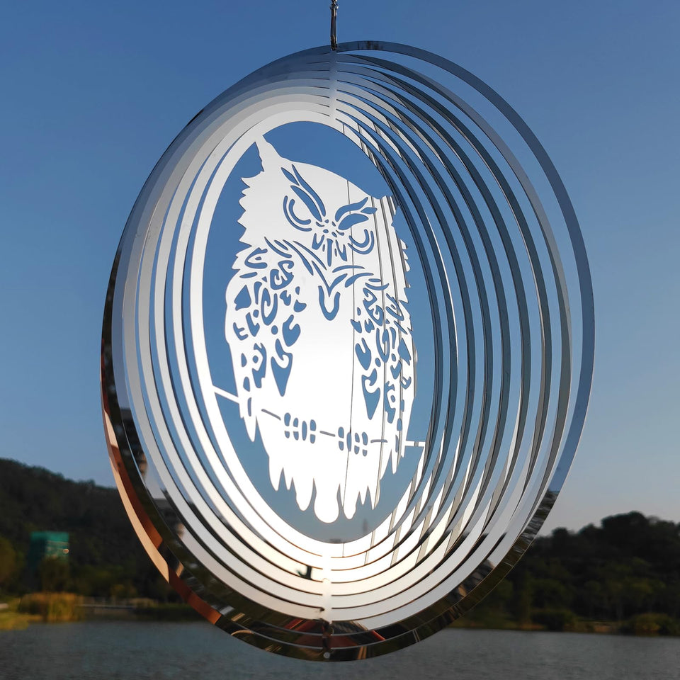 DJUAN owl 3D mirror disc deters birds from patios with reflective surface.