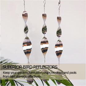 DJUAN sunlit garden display featuring shimmering bird discs for deterrence