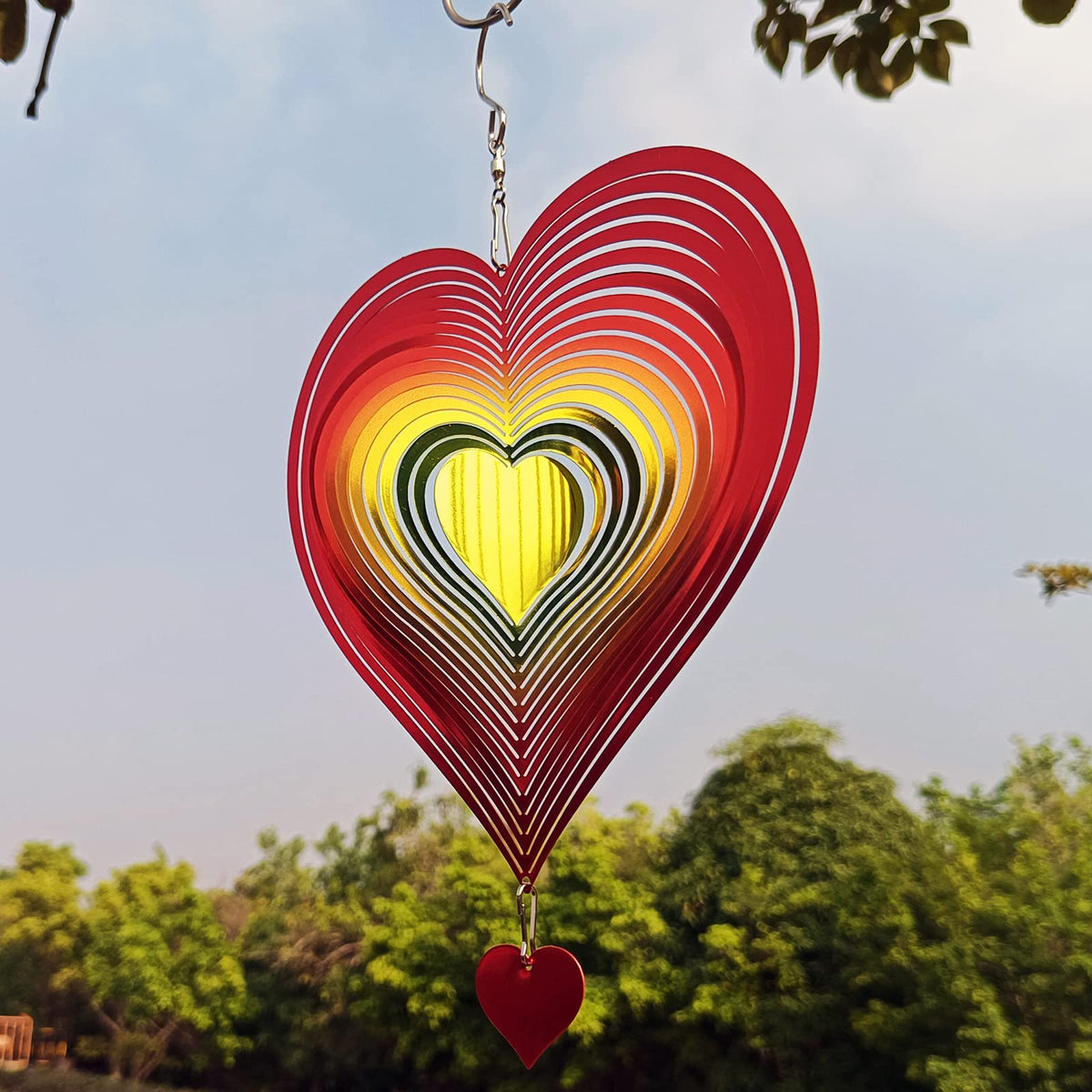 DJUAN wind spinner ideal for indoor/outdoor decor adding dynamic reflective motion.