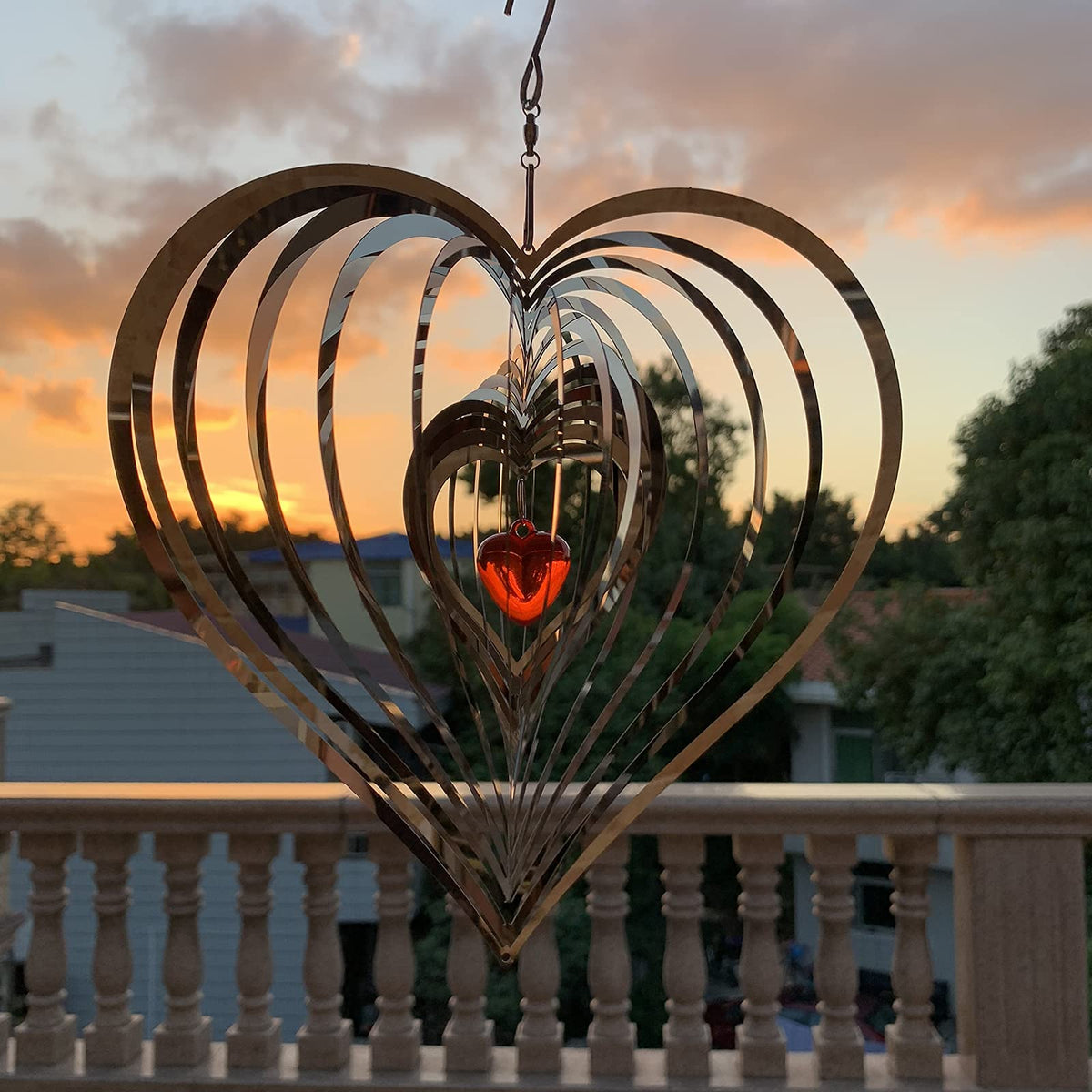 DJUAN wind spinner easily hung on lamps, trees, or walls