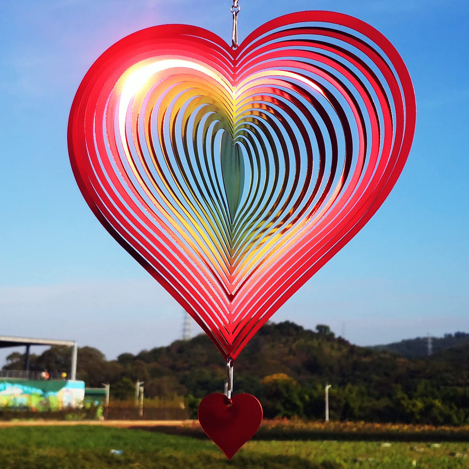 DJUAN wind spinner with red-yellow gradient heart delivers striking 3D reflections in outdoor spaces.