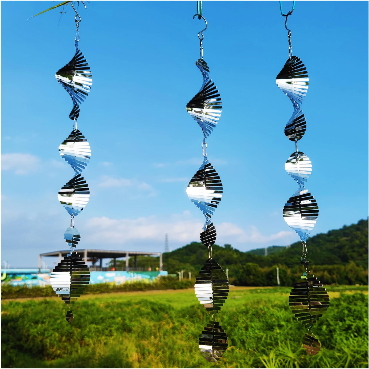DJUAN wind spinner sparkling in breeze provides moving light to deter birds