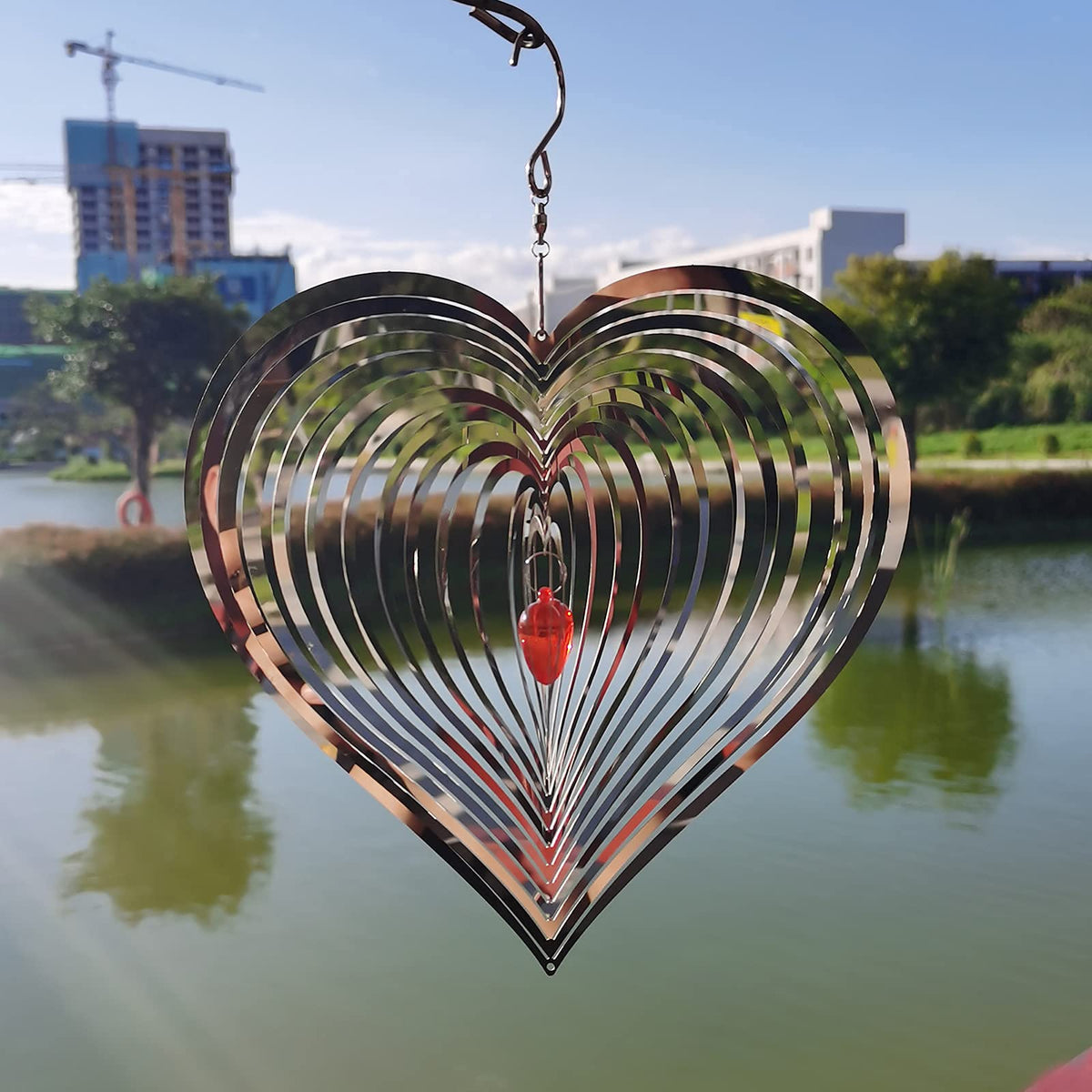 DJUAN wind spinner with three-dimensional pulse effect adds dynamic yard accents
