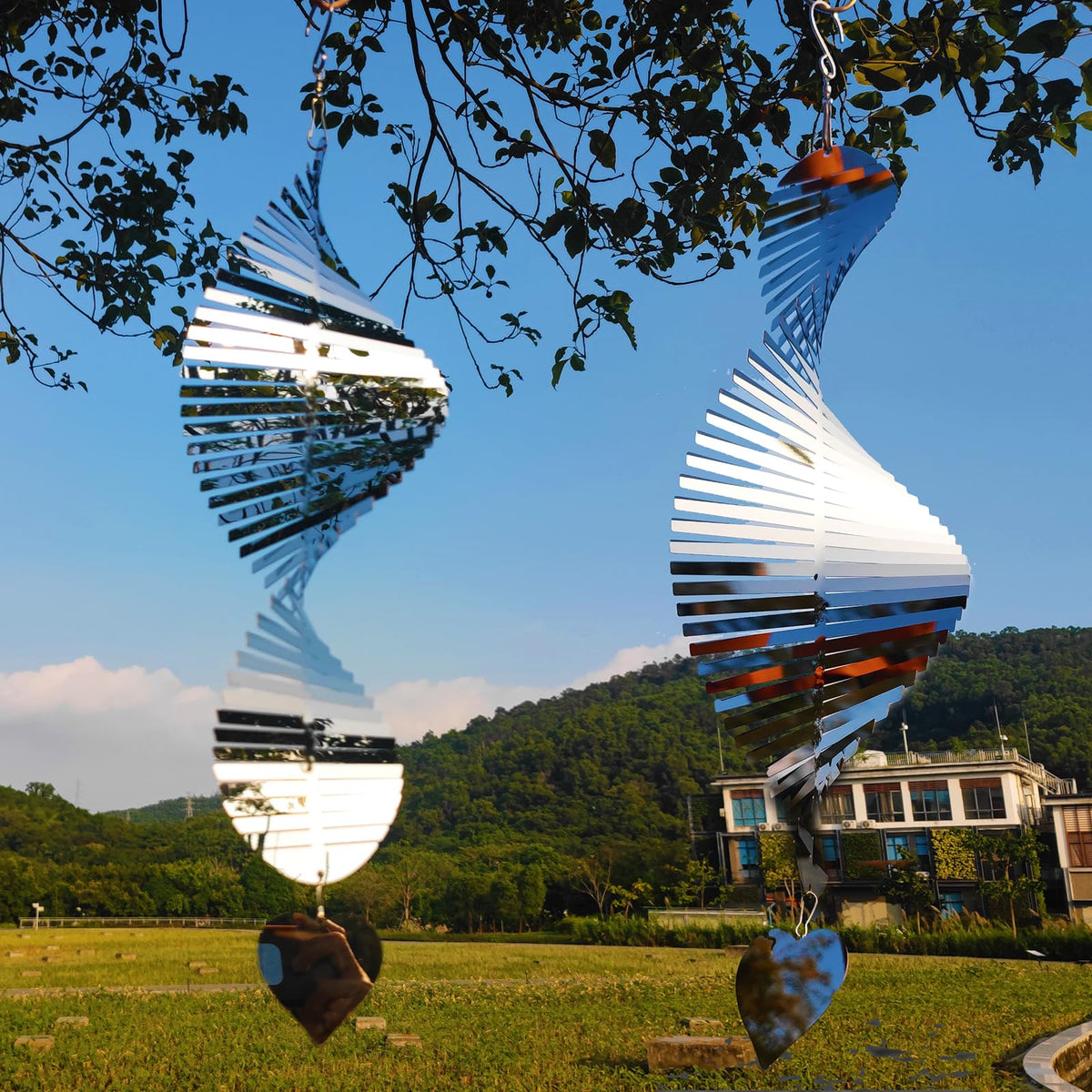 DJUAN wind spinner decor brightens yards while providing bird deterrence.