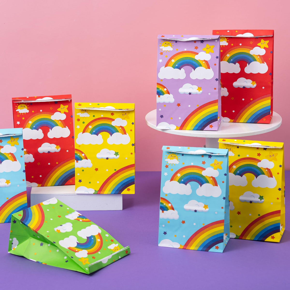 DMIGHT Rainbow party gift bags colorful keepsakes guests can take home.