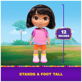 DORA belly squeeze activates music, sounds, and bilingual phrases.