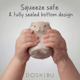 Doshibu Noah's Ark turtle toy encourages sensory exploration during baths.