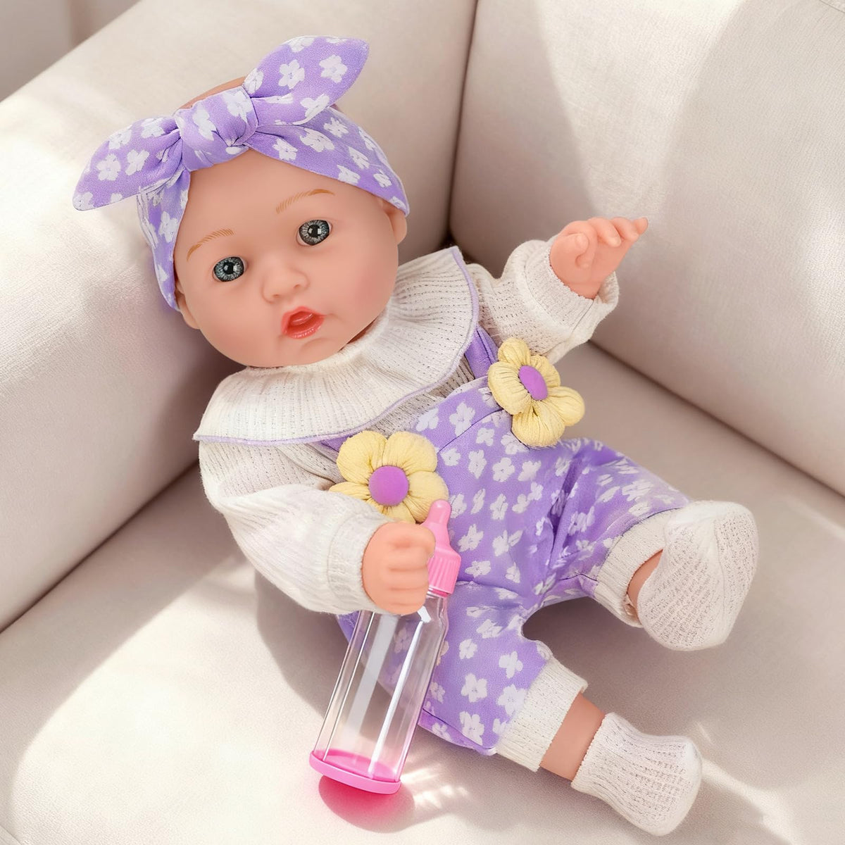 DOTVOSY pacifier included for lifelike doll care routines.