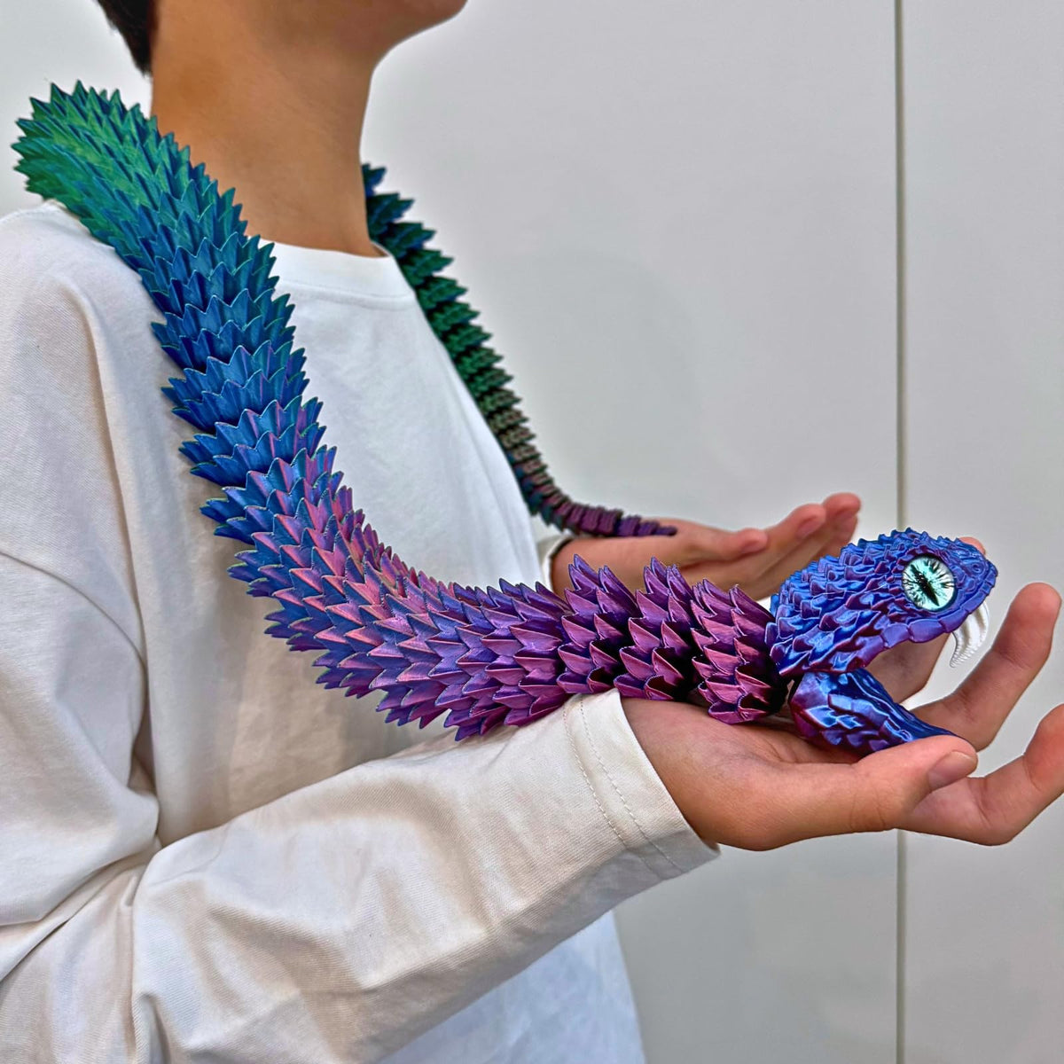 Dpcirk detail-rich snake sculpture highlights lifelike scale texture.