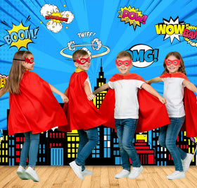 DQZ kid wearing red cape demonstrates easy, comfortable wear for adventures