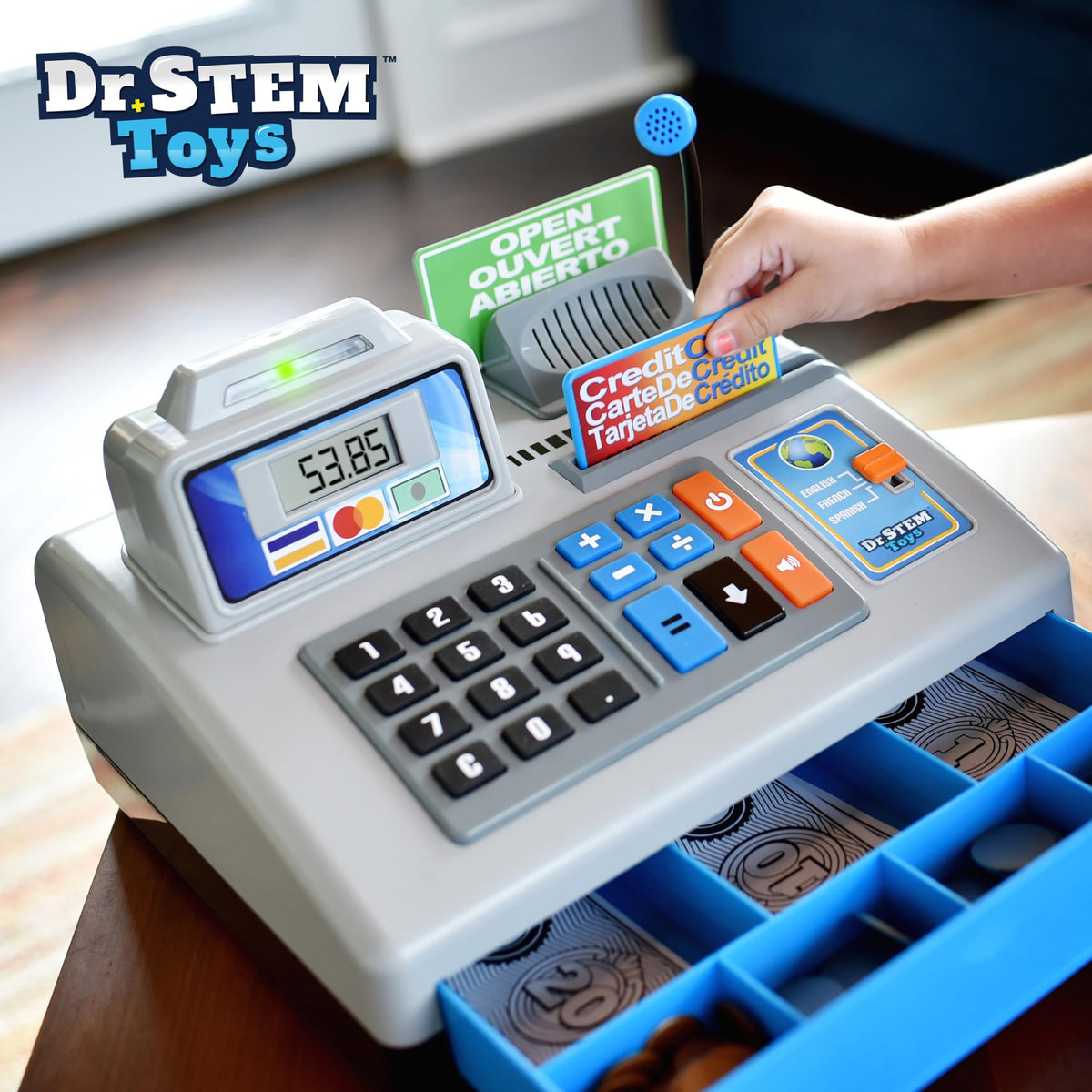 Dr. STEM Toys cash register language panel displaying English, French and Spanish options