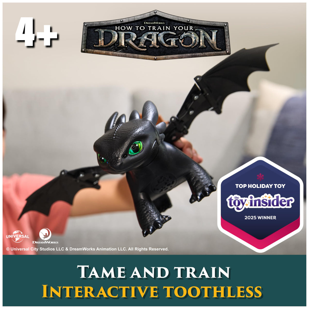 DreamWorks Toothless toy with fish snack demonstrates feeding interaction.