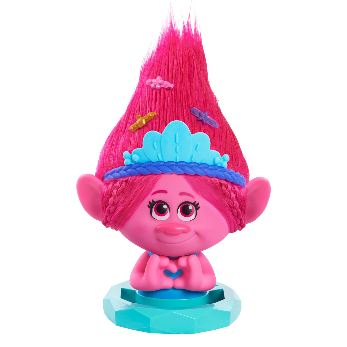 DreamWorks Trolls Poppy styling head with elastics to create playful ponytails.