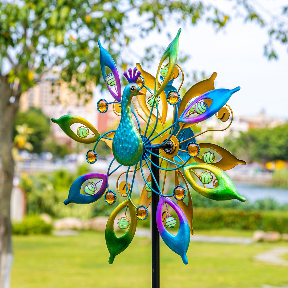 Dreamysoul 65 inch peacock spinner rotates smoothly in garden breeze