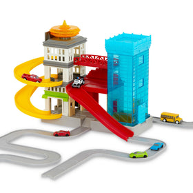 Driven by Battat Big City Cruisin' Fleet playset with vibrant cityscape for imaginative driving.