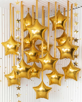 Duraaamo gold 22-inch star balloons create a bold festive focal point
