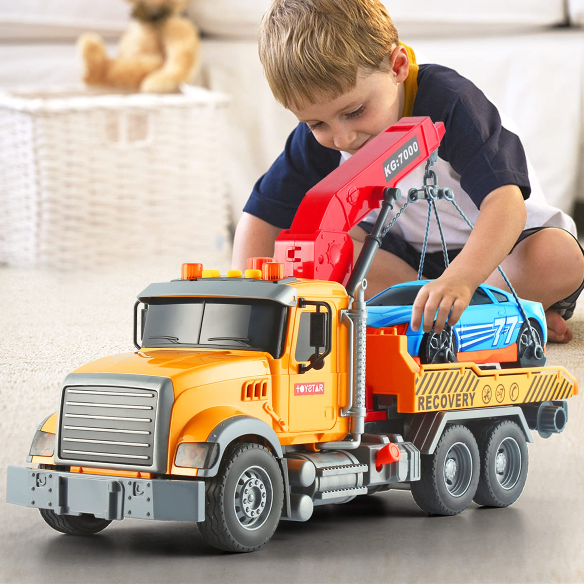 Dwi Dowellin tow truck arm extended highlights the crane feature for pretend rescues.