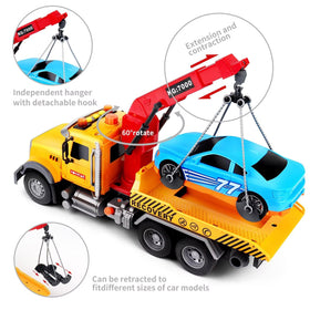 Dwi Dowellin tow truck headlights on for immersive lighting effects.