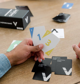 Compact card deck and playtime details of DYCE The Voting Game.