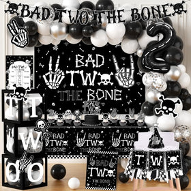 Dydamud Bad Two The Bone backdrop creates a playful birthday scene.