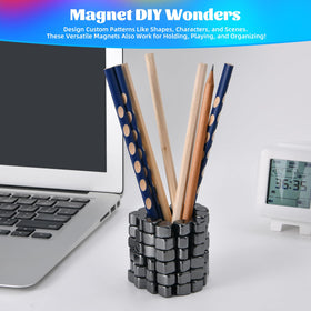 desk toy with magnetic stones beside laptop for discreet focus