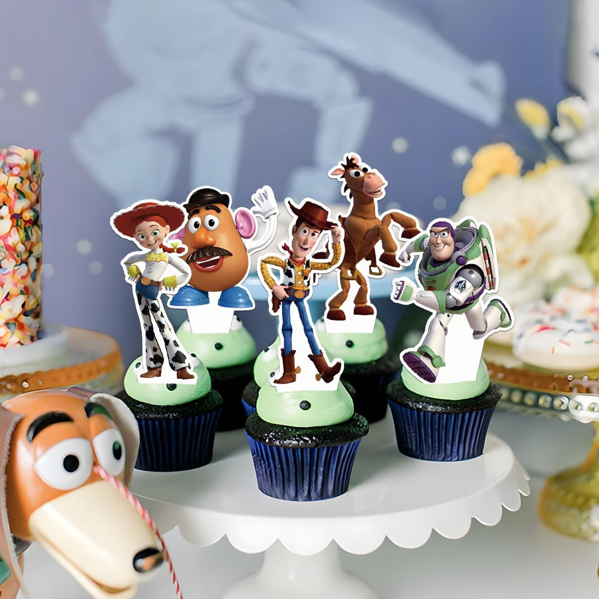 Easy-insert Toy Inspired Story Cupcake Toppers demonstrated on cupcakes