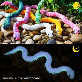 EDGRYJK 3D printed snake displayed as a decorative piece.
