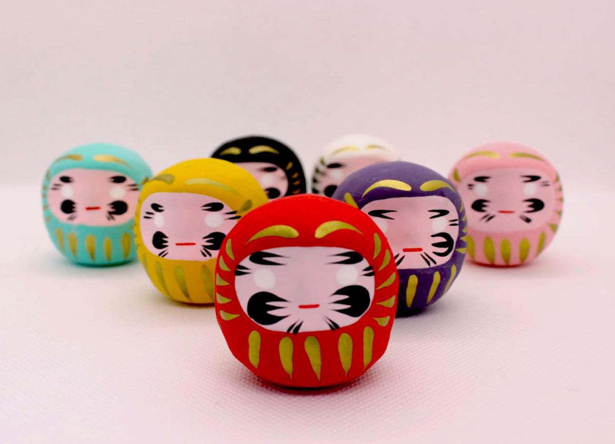 EDOYA Purple Daruma offers guidance and protection during uncertain moments.