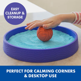 Educational Insights Playfoam Sand Sensory Spheres smoothing sphere erases patterns and resets the tray.