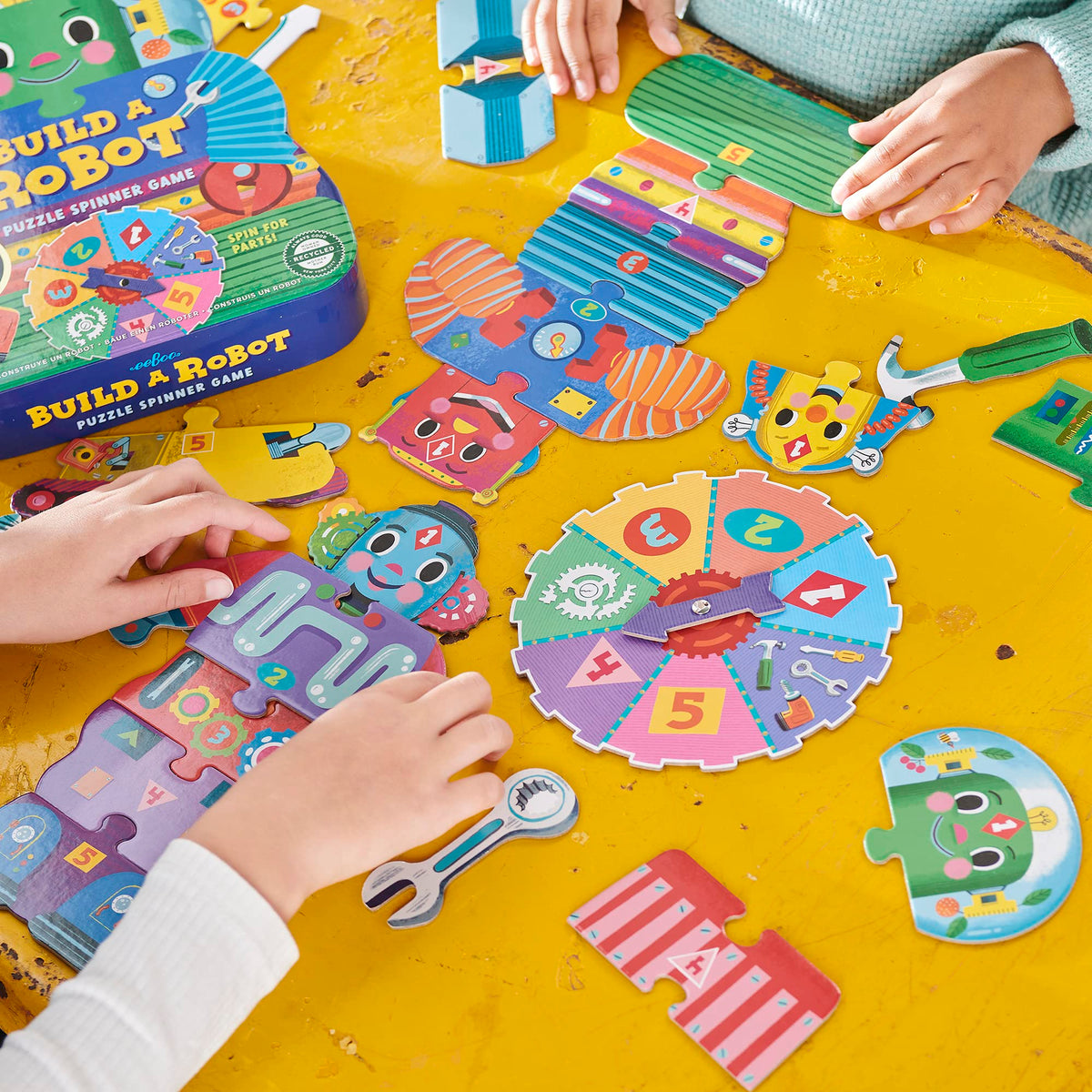 eeBoo Build a Robot Spinner Game robot pieces fostering cooperative building and storytelling
