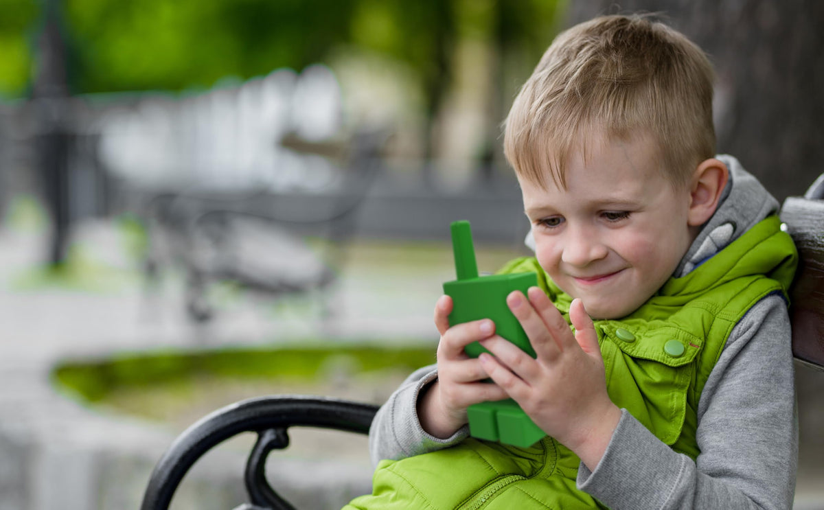 ekids Minecraft Walkie Talkies graphics Minecraft design on device.