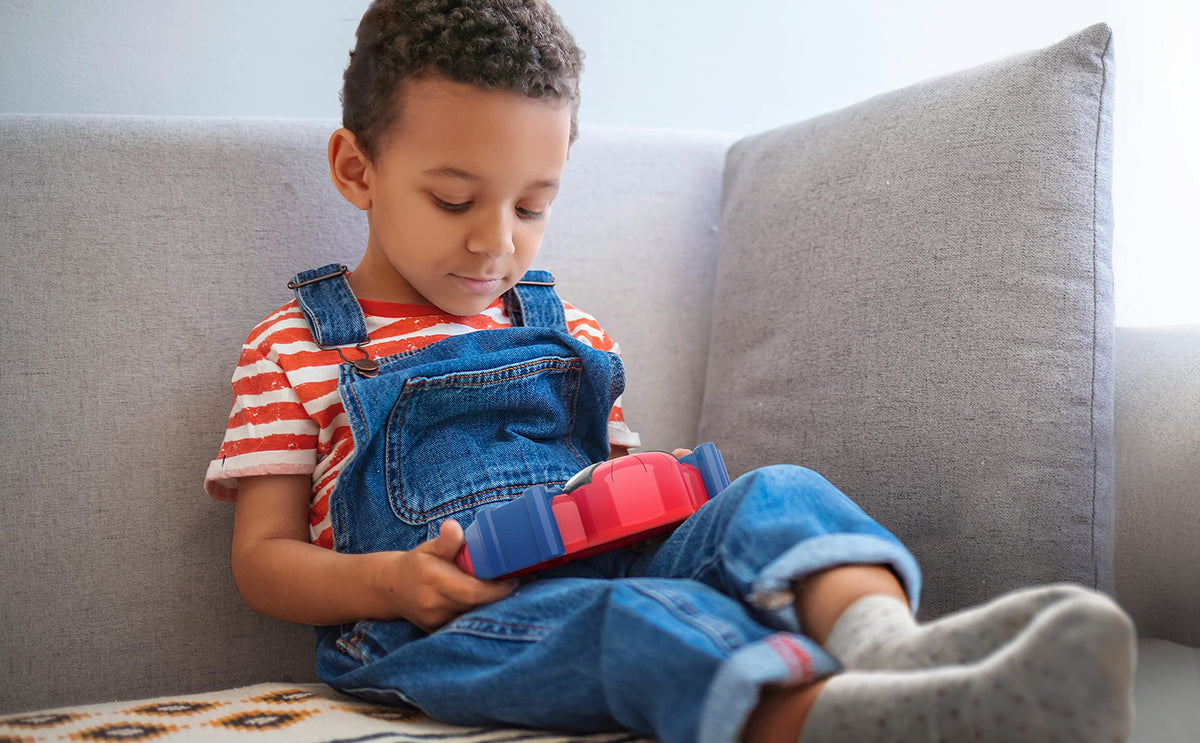 ekids Spidey tablet with light-up buttons provides tactile learning cues.