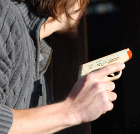 Elastic Precision Walnut PPK with walnut grips offering strong balance and style.