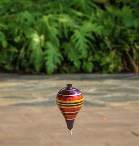 ELIASM Trompo set on smooth surfaces like tile or cement for precise spins