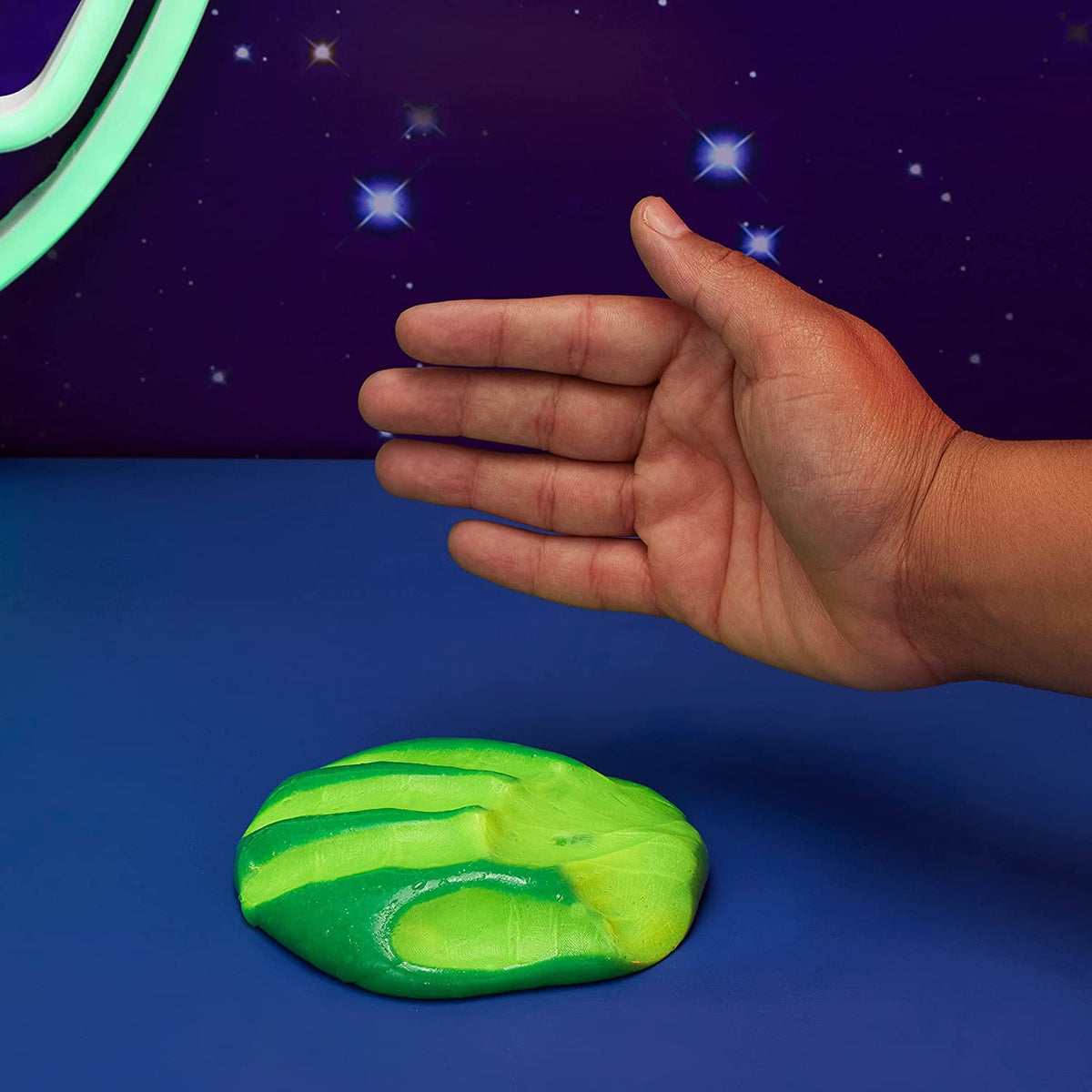 Elmer’s Dinosaur Night Slime Kit glow effects enhance night-time slime sessions.