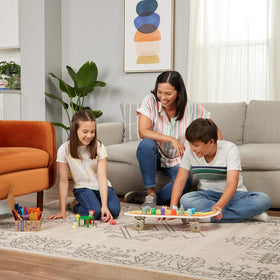 Elmer's Squishies stir sticks help measure and mix textures precisely.