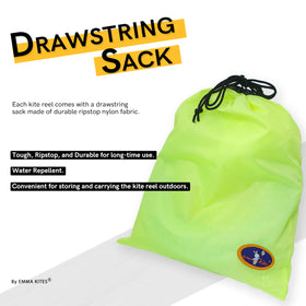 Emma Kites 500ft 120lb Dacron line visible on beach reduces tangling.