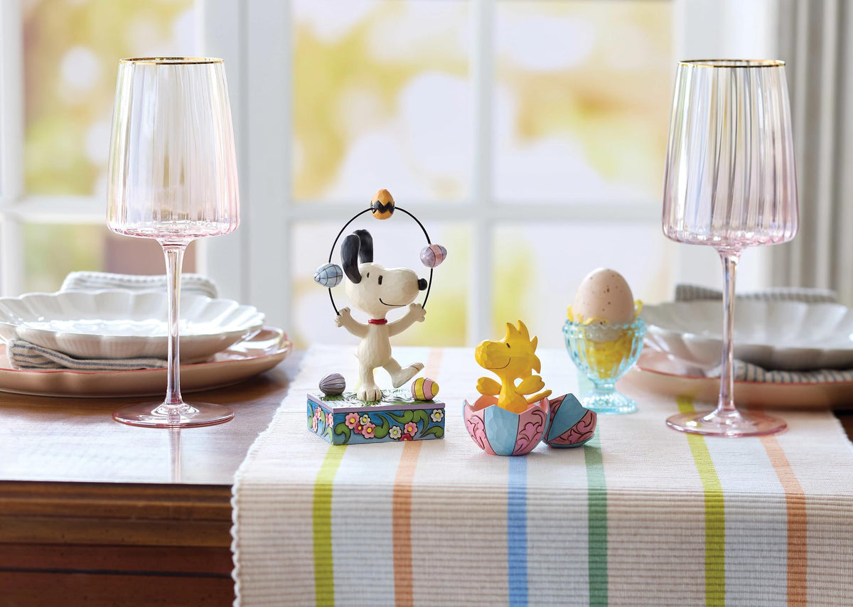 Enesco Snoopy Easter eggs figurine with vivid colors for spring decor.