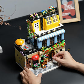 ENJBRICK City Hotel piano room detail encourages creative storytelling and fine motor skills.