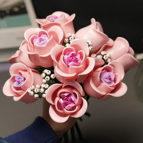ENJBRICK White baby breath stems add volume to the floral display