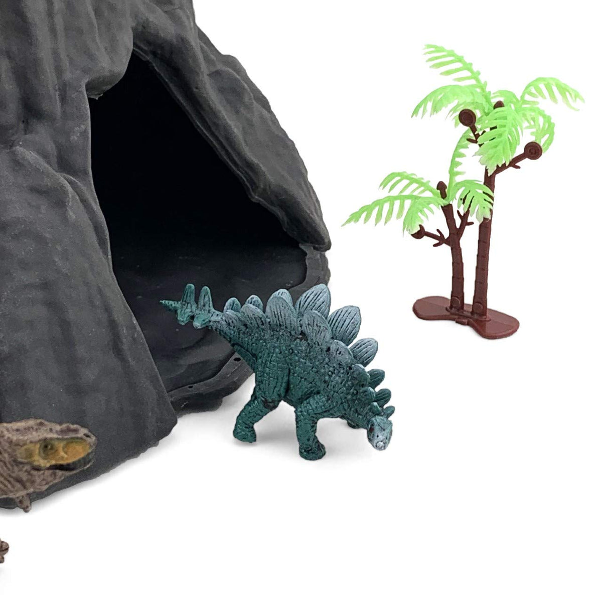Enjoyin Stegosaurus figure enhances adventurous forest-backdrop play