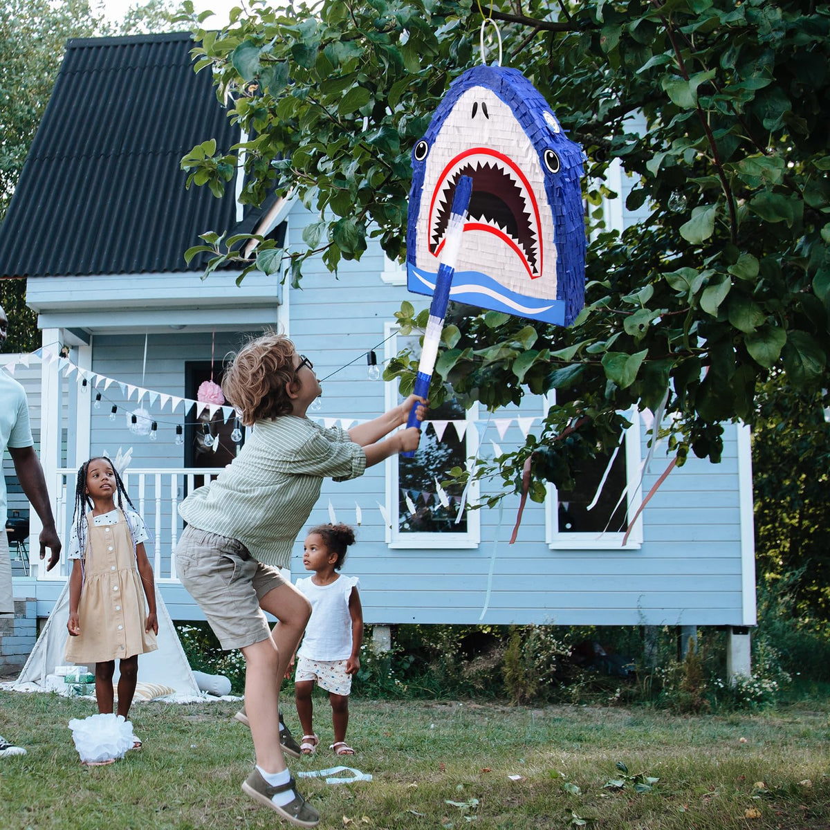 EnriQ shark pinata kids playing action creates memorable moments