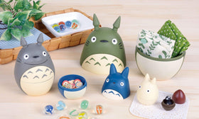 Ensky Totoro nesting dolls lined display creates a charming Totoro vignette