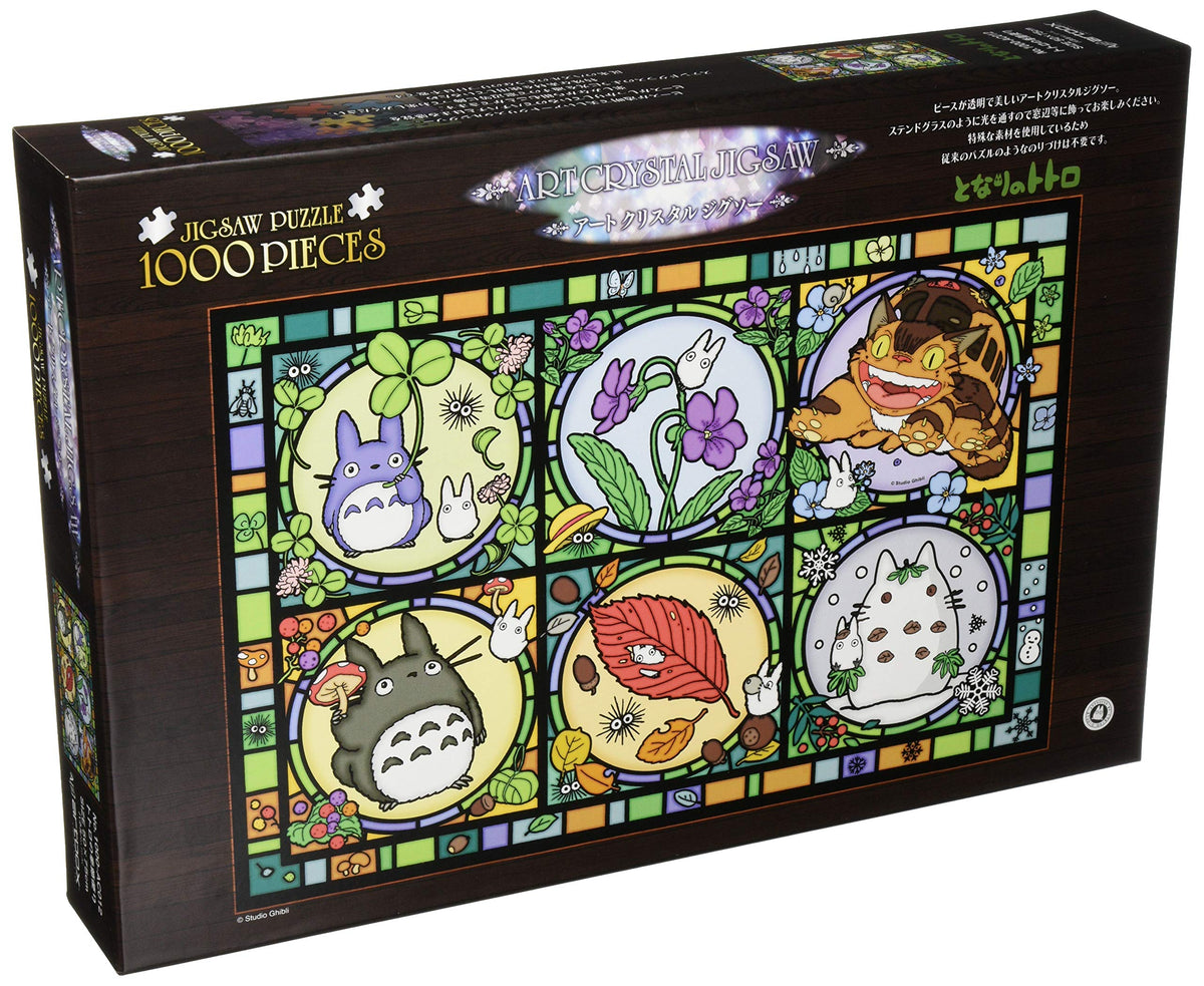 Ensky Totoro Seasonal Tidings Art Crystal Puzzle window display that gleams with light through the pieces